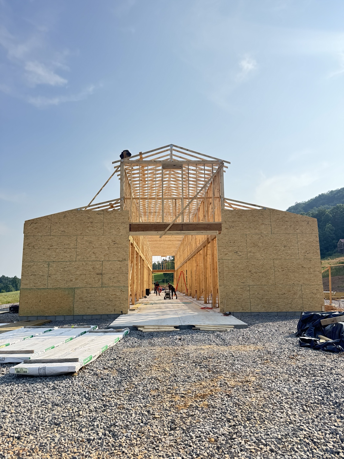 New building sheathing and upper wall framing